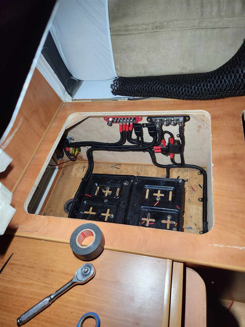 Battery trays with bus bar and fuse wiring